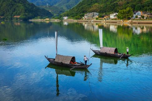 Two boats rolling