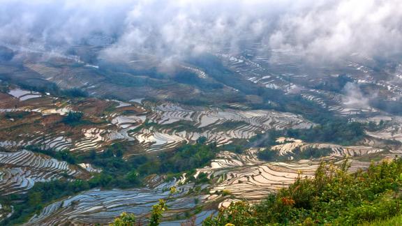 Clouds over terraced lands