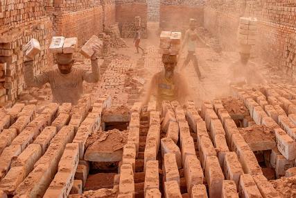 Loading bricks over head 5