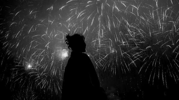 The silhouette under the fireworks2 The silhouette under the fireworks2