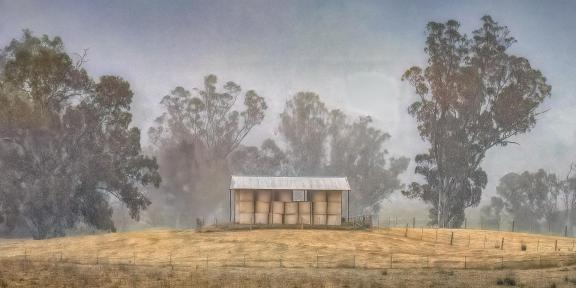 Hayshed in the fog