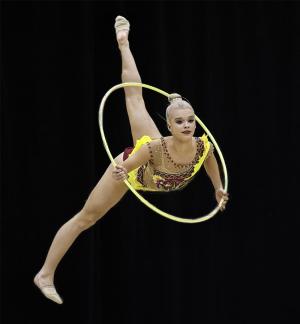 Gymnast Jumping with Hoop