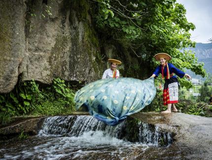 Yao girls wash and dye cloth